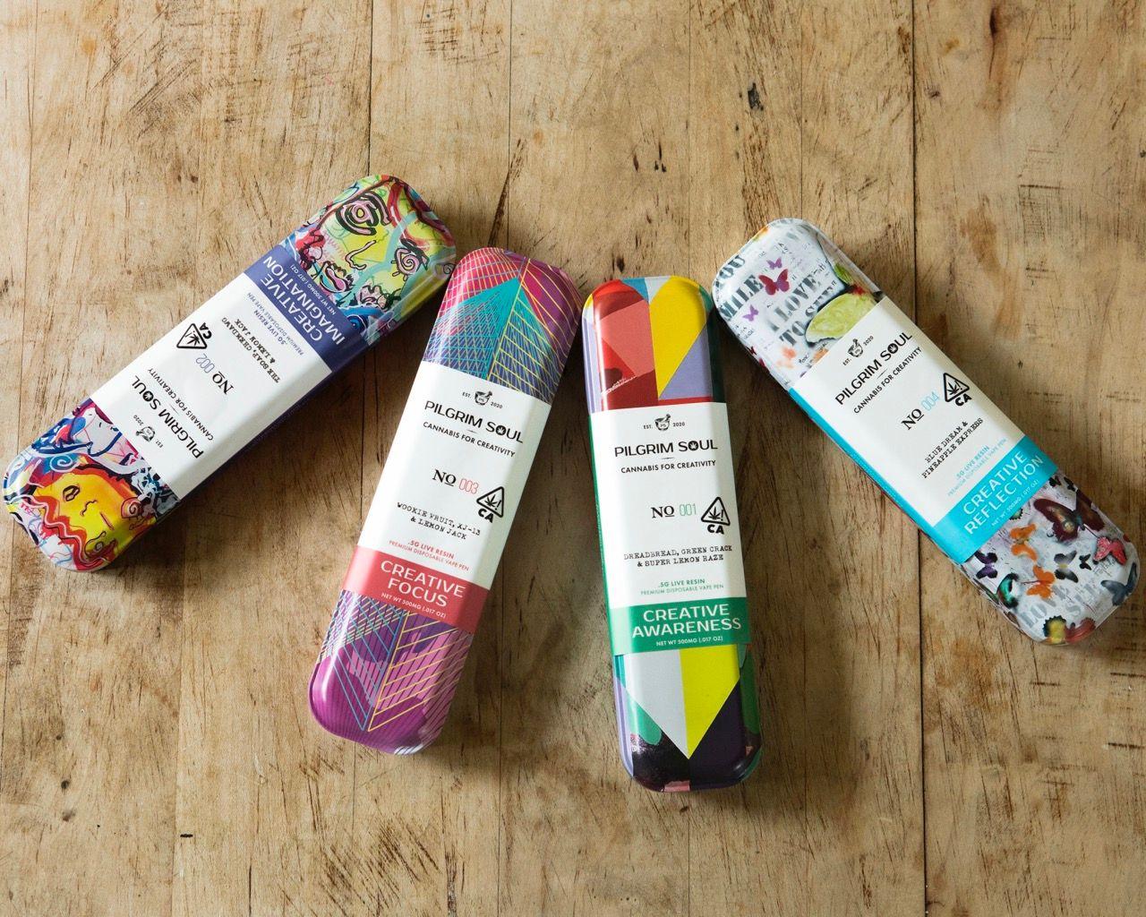 Product shot of 4 containers with printed graphics for Pilgrim Soul's cannabis product